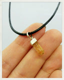 Colgante de topacio imperial y plata